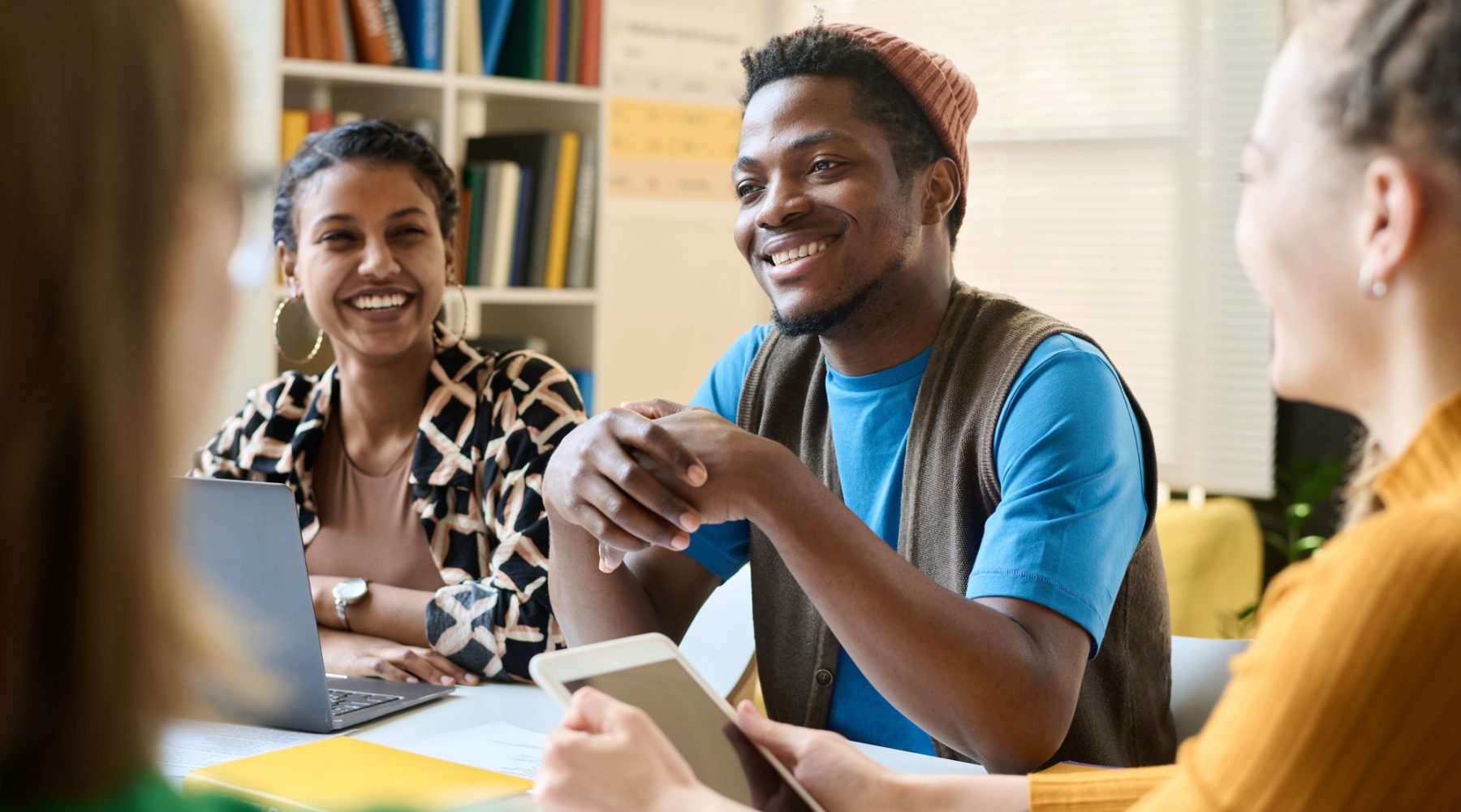 Smiling Black Student Speaking in Class